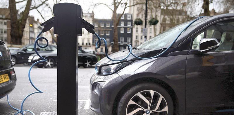 Electric vehicle charging Photo: Reuters